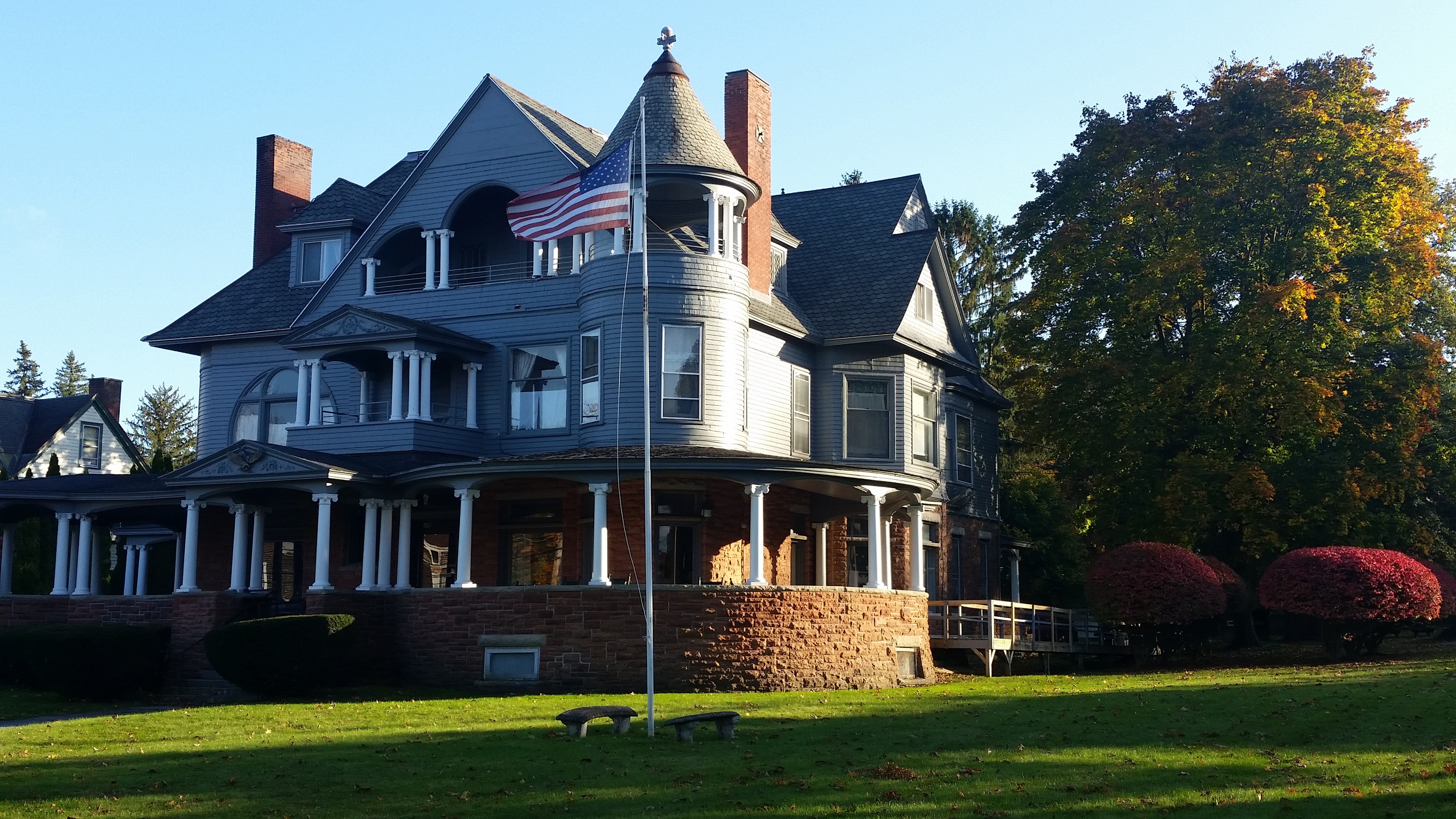 Historic Vermont house with autumn foliage