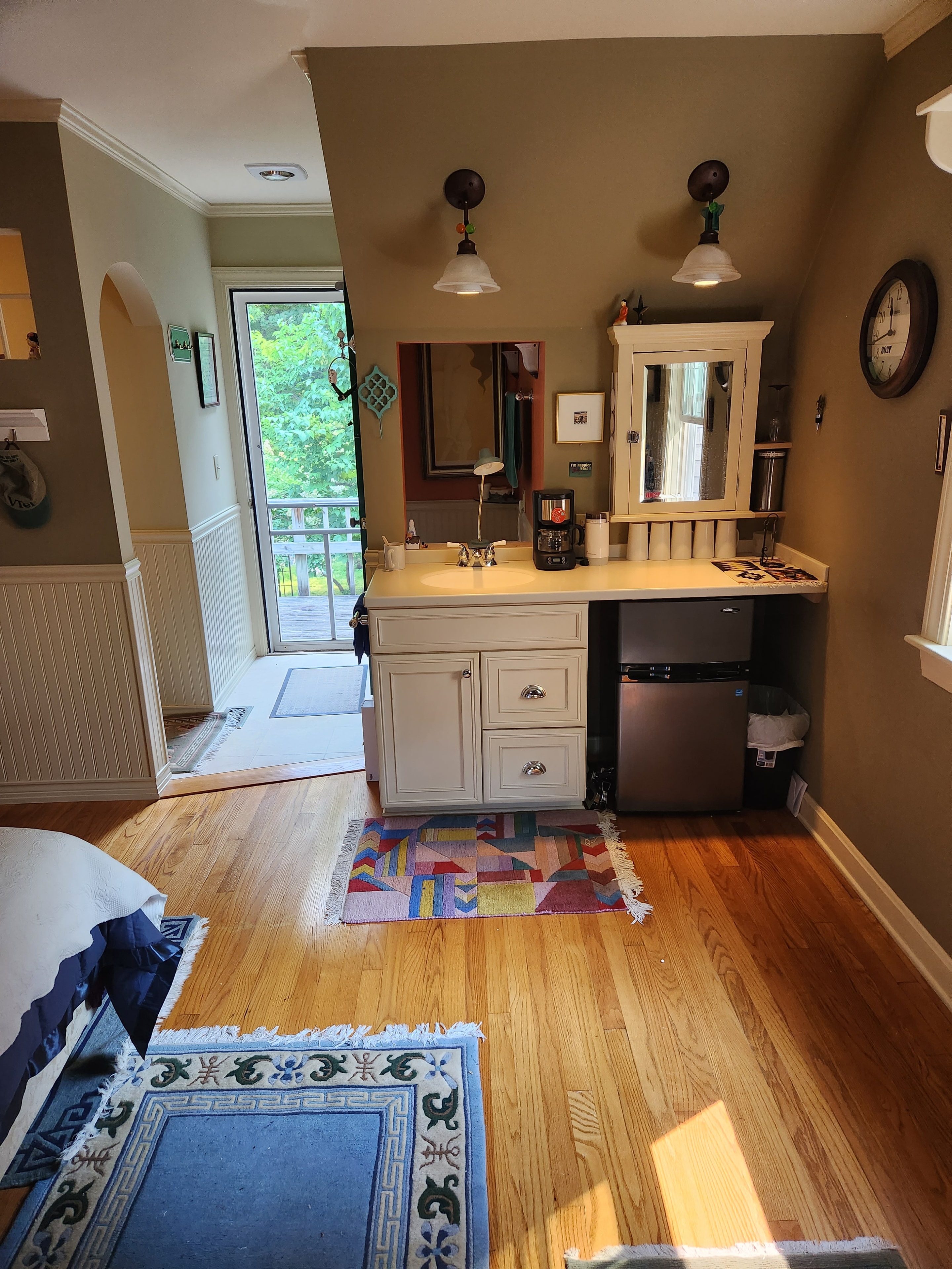 Warmly lit Vermont interior with hardwood floors and furnishings